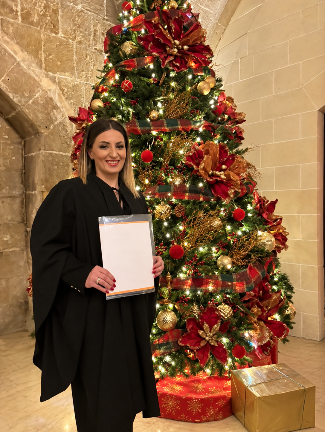 Manueline, the baker behind The Insta Appetite, standing by her Christmas tree